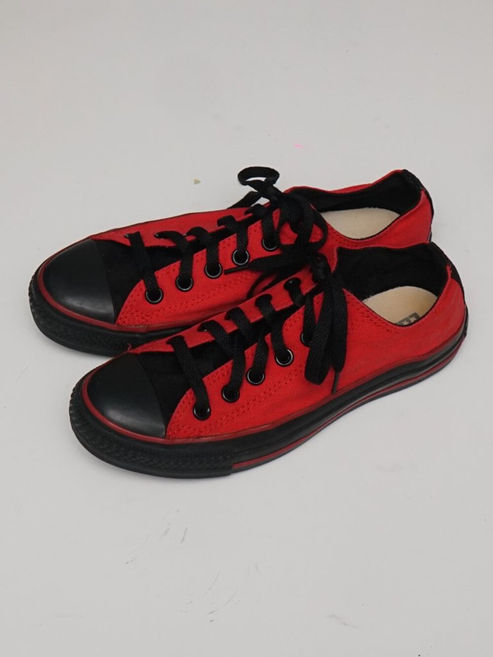 Converse All Stars Chuck Taylor low-top sneakers, red and black, women's size 7